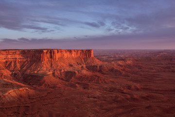 red canyon at sunset with purple sky