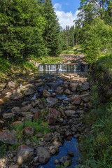 Fototapeta na wymiar The river Bear Creek in the national park Krkonose in the Czech Republic 