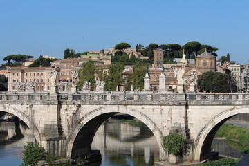 Fototapeta na wymiar Ponte Sant Angelo with Gianicolo hills 