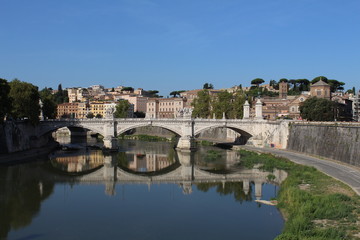 Fototapeta na wymiar Ponte Sant Angelo with Gianicolo hills in background