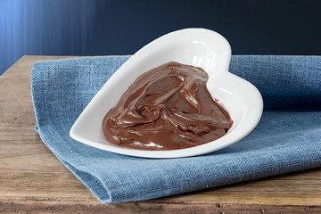 chocolate cream on heart bowl