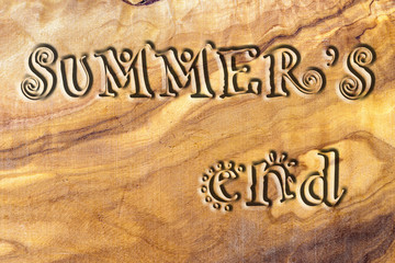 summer's end carved on olive wood