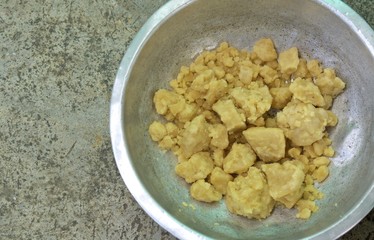 sugar blocks in a stainless steel bowl