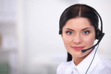 Portrait of beautiful businesswoman working at her desk with