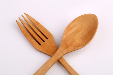 Wooden fork and wooden spoon made by Teak isolated on white back