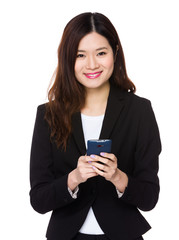 Fototapeta premium Young businesswoman use of the cellphone