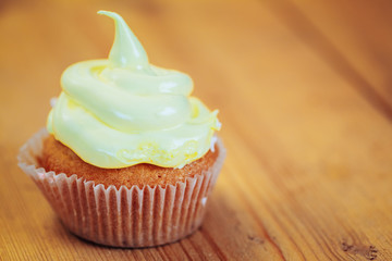 Dessert Sweet Gourmet Cupcake On Wooden Background
