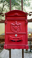 red vintage postal box