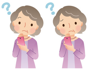 スマホを持つ高齢者　女性　表情