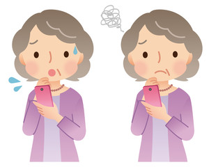 スマホを持つ高齢者　女性　表情