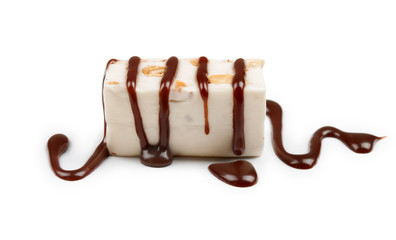 pouring chocolate candy nougat and peanuts on a white background - obrazy, fototapety, plakaty