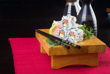Obraz na płótnie Canvas japanese cuisine. sushi on the background