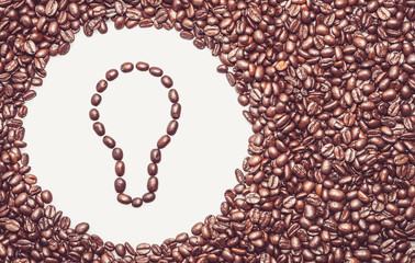 Coffee texture with a lightbulb symbol