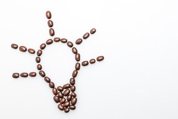 Coffee beans lightbulb symbol