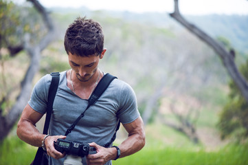 Fashion photographer photographing  nature