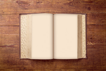 Open Book blank on old wood background