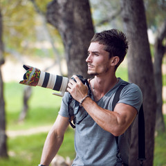 Fashion photographer photographing  nature