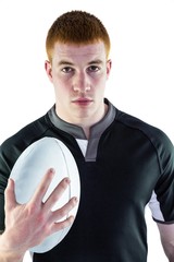 Rugby player holding a rugby ball