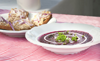 Homemade delicious beetroot soup served in traditional rural sty