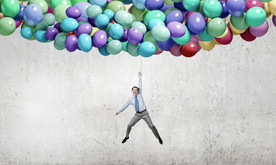 Businessman flies in sky