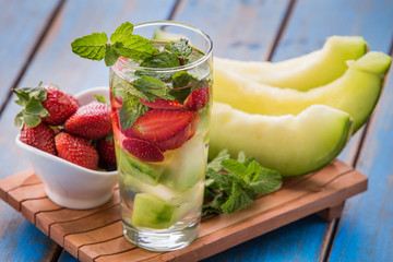infused water mix of strawberry, melon and mint leaf