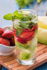 infused water mix of strawberry, melon and mint leaf