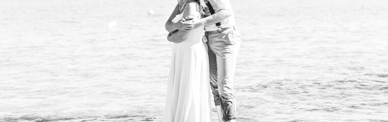 Bride and groom by the sea 