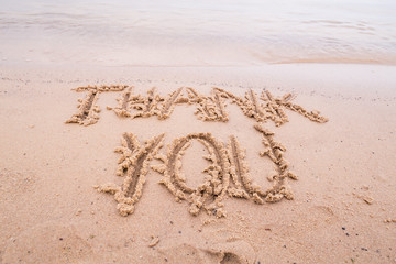 Inscriptions on the sand: Thank you