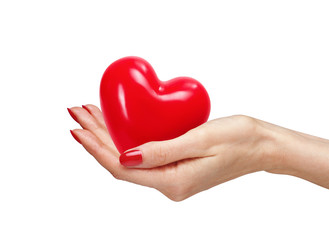 Fototapeta na wymiar Red heart in woman hand, isolated on white