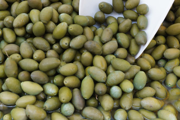 Background texture of fresh green olives
