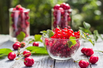Fruits cherries currants wooden background