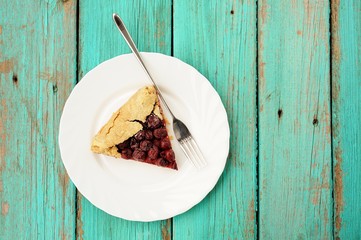 Little piece of homemade vegan wholegrain galette with cherries