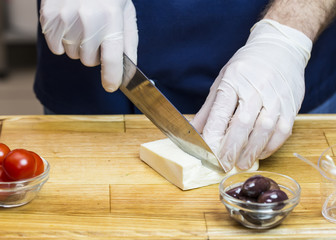 cook prepares canapes in the kitchen at the restaurant