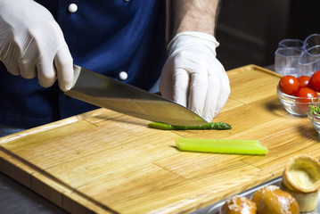 cook prepares canapes in the kitchen at the restaurant
