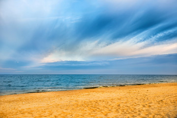 Tropical beach and blue sea with waves