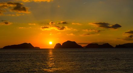 Naklejka na ściany i meble sunset in the Philippines in the area of El Nido