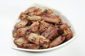 Dry squid in white bowl