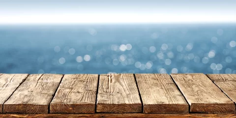 Selbstklebende Fototapeten wooden pier and sea  © magdal3na
