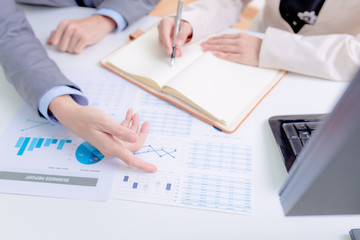 Business people discussing the charts and graphs showing the res