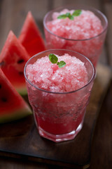 Glasses with delicious watermelon granita, close-up, studio shot