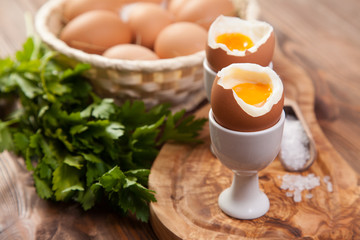 Boiled eggs on a wooden background