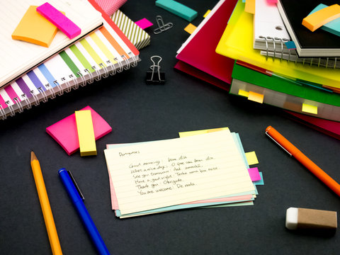 Learning New Language Writing Words Many Times on the Notebook;