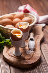 Boiled eggs on a wooden background