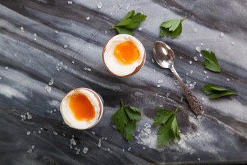 Fototapeta na wymiar Boiled eggs on marble background