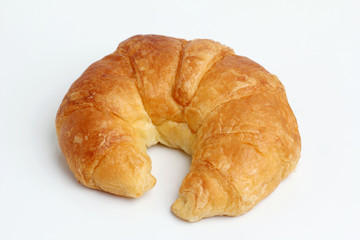 one brown glod croissant