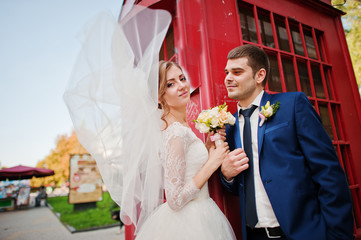 Wedding couple background red call box
