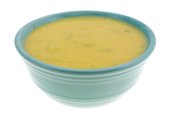 Broccoli and cheese soup in a small bowl