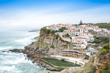 Azenhas do Mar white village landmark on the cliff and Atlantic