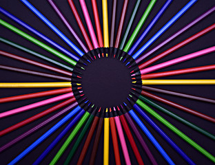 Set of Realistic Colorful Colored Pencils on the black background 