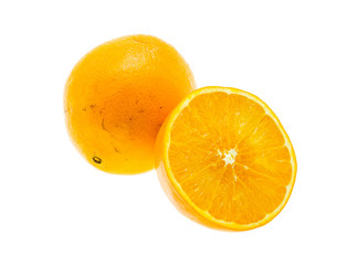 Orange fruit with slice on white background